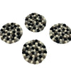 Multi-grey felt ball coasters round set of 4 made of black white and gray woolen balls in concentric pattern