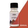 A clear glass 10 ml bottle of ancient wisdom myrrh fragrance oil with black cap and allergen declarations label