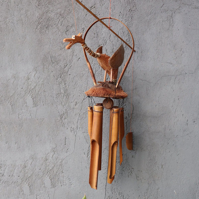 Handcrafted wooden dragon wind chime with natural bamboo tubes and a coconut husk base for outdoor decor