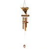 A natural bamboo wind chime with carved wooden owl, natural wood tones, and hanging metal clapper at the base