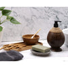 Dark brown coconut soap dispenser with black pump and woven rope accent made from coconut shell 150ml capacity