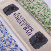 Beige linen lavender wheat bag with green and purple floral embroidery natural cotton and wheat heating bag