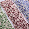 Beige cotton and wheat heating bags with red blue and green floral embroidery in a natural cotton and wheat purple set