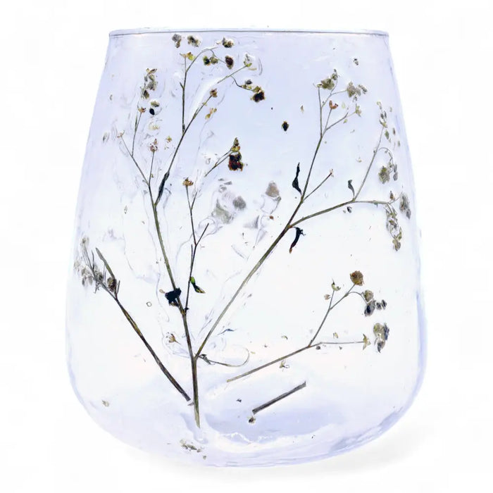 Clear glass recycled glass candle holder vase with preserved baby’s breath and dried botanicals natural floral style