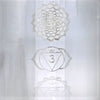 Silver chakra meditation plaque with engraved lotus and triangle symbols on natural selenite block lamp