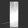 Natural selenite block lamp with a translucent white slab and carved tree of life design for ambient lighting