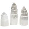 Natural selenite tower lamps in three sizes with translucent white stepped pyramid-like crystal formations