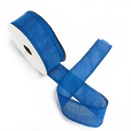 Natural texture ribbon in navy blue mesh wound on a white spool for crafts and decor projects