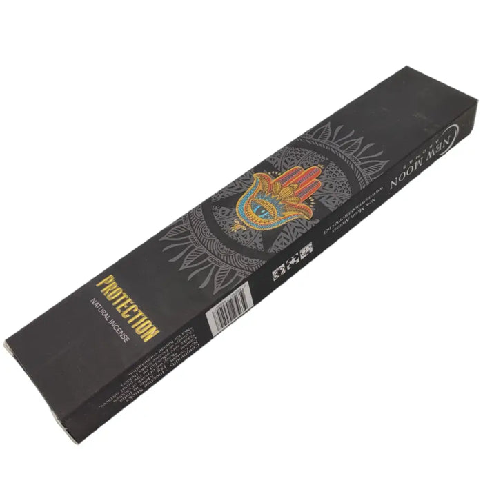 Black rectangular box of new moon aromas natural incense sticks labeled protection with colorful hamsa hand design