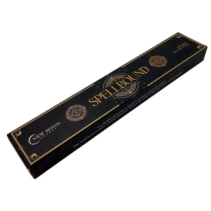 Black rectangular box of natural incense sticks with gold foil geometric designs labeled spellbound by new moon aromas