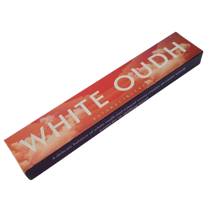 A rectangular box of new moon aromas natural incense sticks with white oudh scent and orange red cloud design