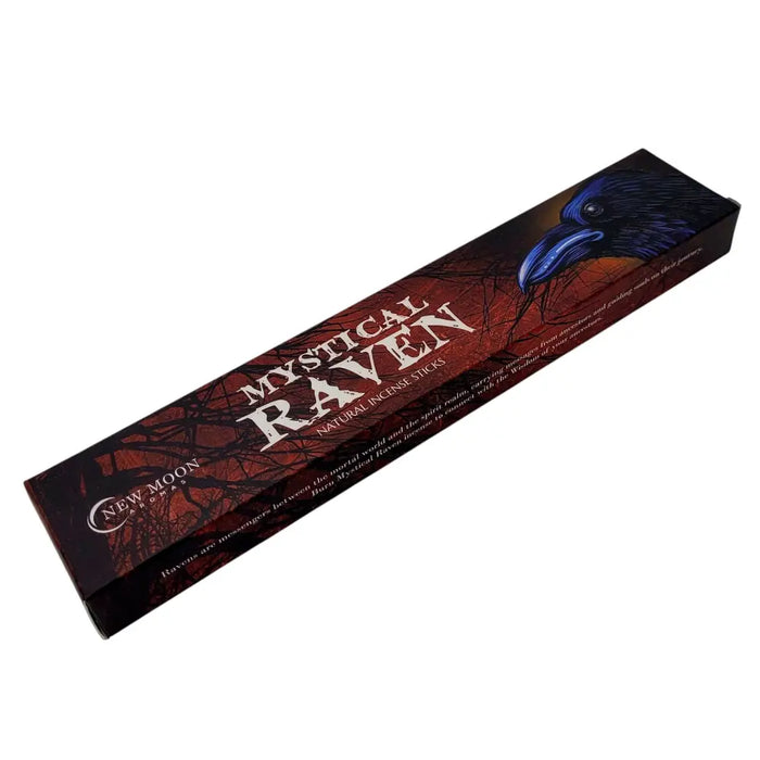 A rectangular box of new moon aromas natural incense sticks with a blue raven design in dark red and black, featuring moon aromas and black rose themes