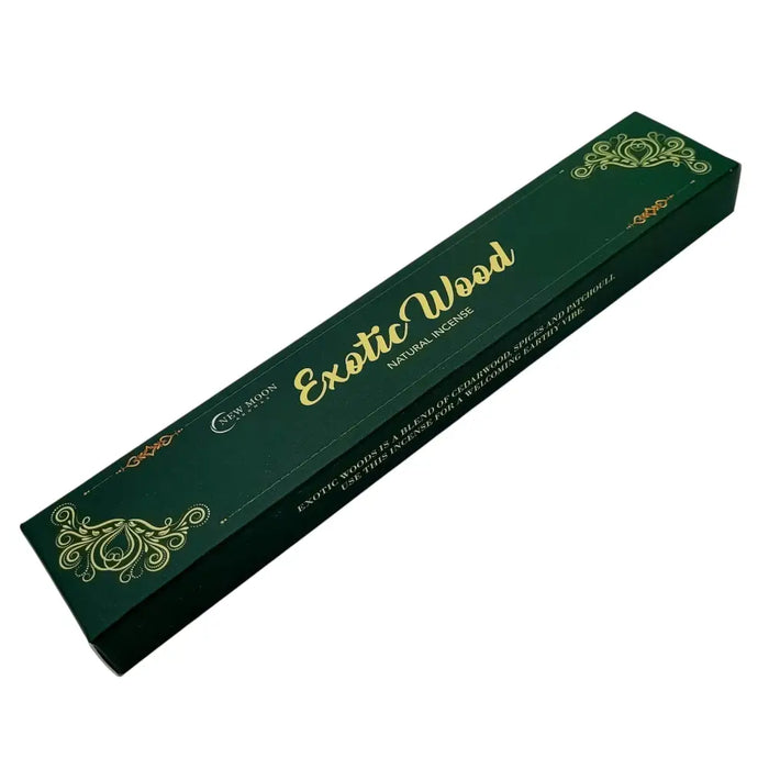 Deep green rectangular box of new moon aromas natural incense sticks with gold floral designs and exotic wood scent