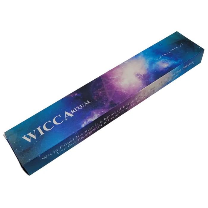 A rectangular box of new moon aromas natural incense sticks with a cosmic nebula design in blue purple and white