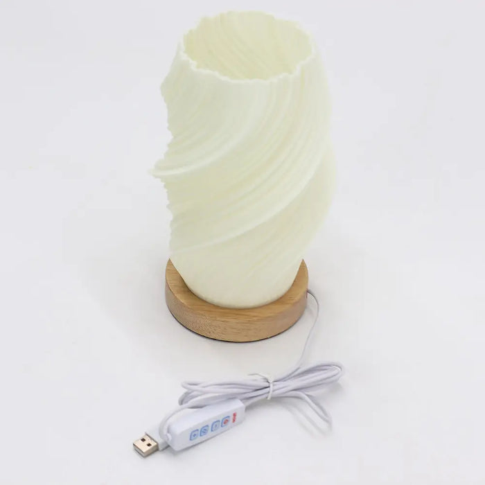 New wave lamp cloud twisted cream spiral textured with wooden base and usb charging cable on a white background
