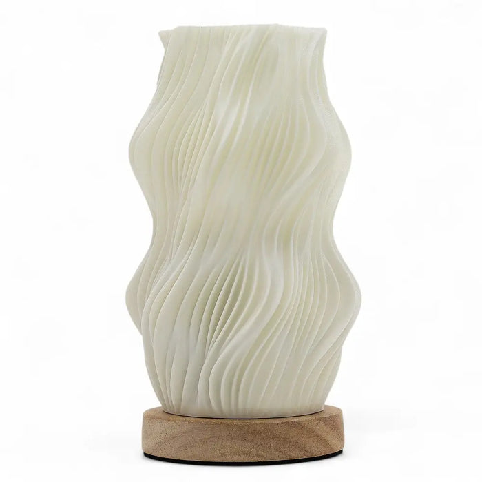 New wave lamp star twisted with cream ceramic wave pattern and natural wood base on a plain background