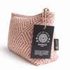 Nomad sari indian jacquard toiletry bag in coral maze pattern with pink cream herringbone fabric and gold zipper pull