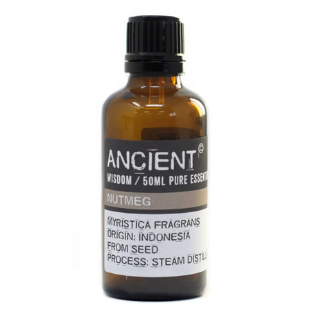 A 50ml amber glass bottle of ancient wisdom nutmeg essential oil from indonesia with a black ribbed cap and allergen declarations