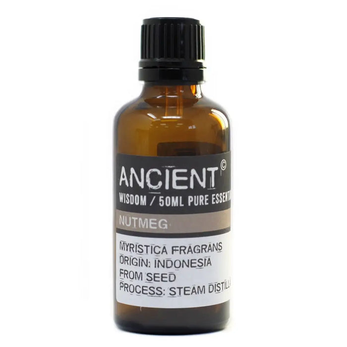 A 50ml amber glass bottle of ancient wisdom nutmeg essential oil from indonesia with a black ribbed cap and allergen declarations