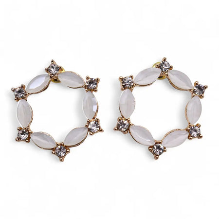 Gold-toned loop earrings with oval white opal-like glass stones and clear crystal pearl accents