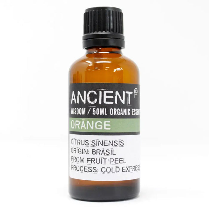 A 50ml amber glass bottle of ancient wisdom orange essential oil from brazil with a black ribbed cap and citrus sinensis label