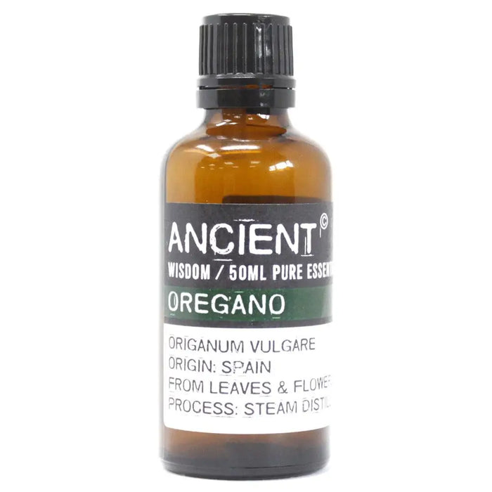 A 50ml amber glass bottle of ancient wisdom oregano essential oil with a black ribbed cap and spanish origin label