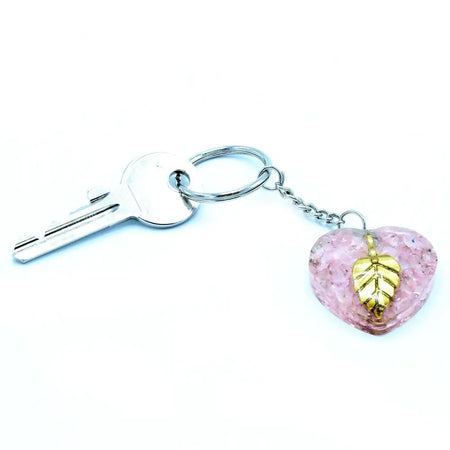 Pink heart-shaped orgonite power keyring with rose quartz and gold leaf resin design