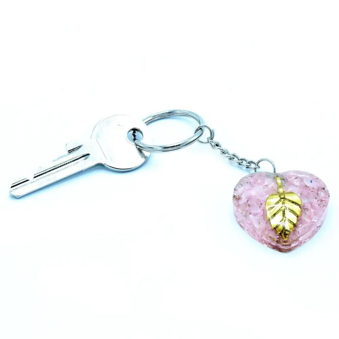 Pink heart-shaped orgonite power keyring with rose quartz and gold leaf resin design