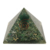 A 5cm orgonite pyramid angel made of translucent green resin with emerald gemstones copper spiral and gold flakes