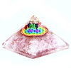 Orgonite pyramid with rose quartz crushed quartz and gold flakes and a rainbow flower of life design on top