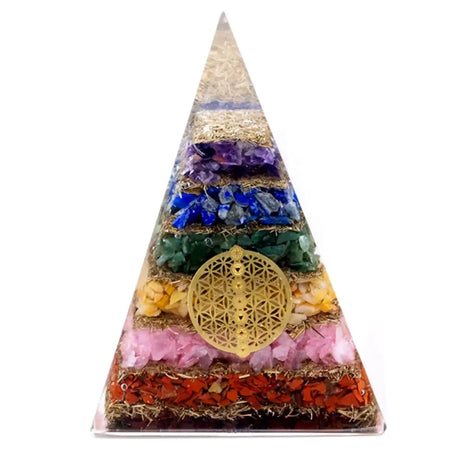 A clear resin orgonite pyramid with seven colorful crystal layers and flower of life design large size