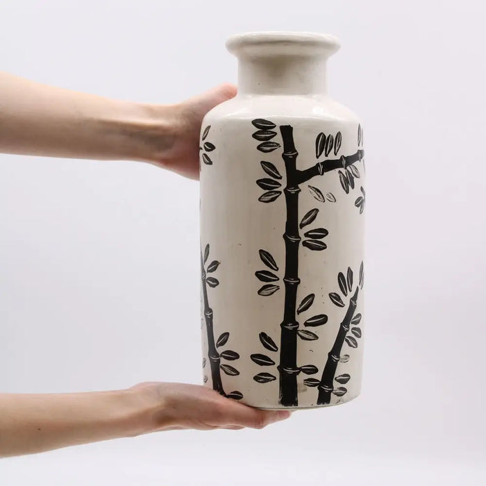 Cream-colored ceramic vase with black bamboo and leaf motifs called oriental straight ceramic vase natural finish