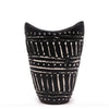 Ornamental shaped ceramic vase chocolate colored with black base and white swirls and dotted geometric patterns