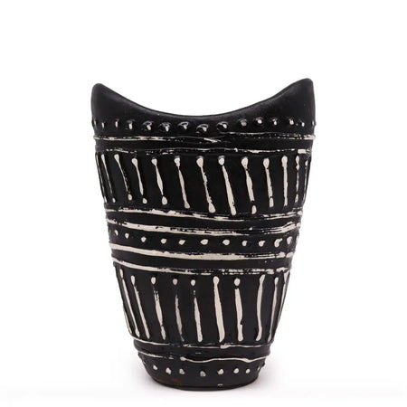 Ornamental shaped ceramic vase chocolate colored with black base and white swirls and dotted geometric patterns