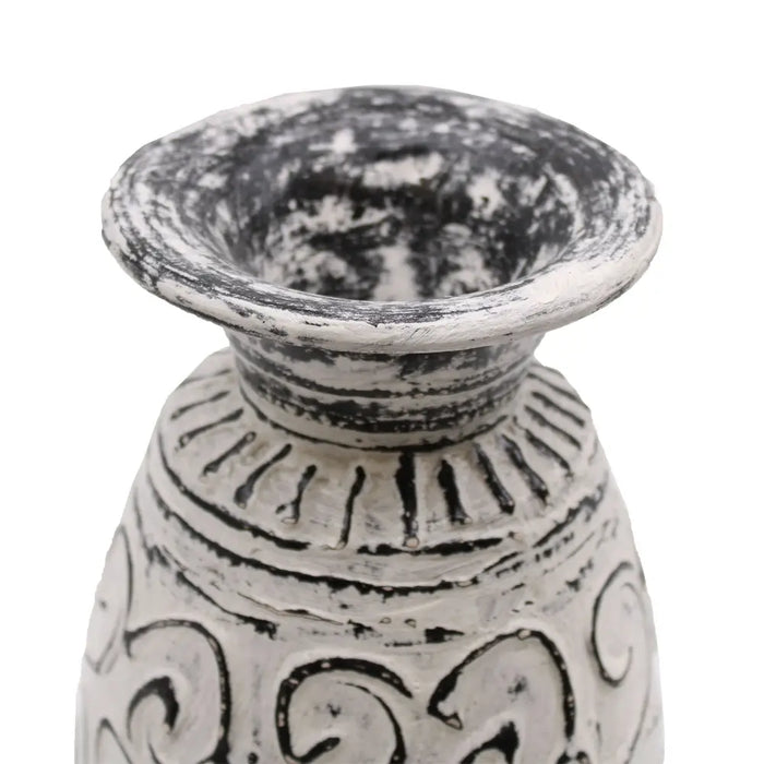A distressed white ceramic vase with black swirl and line patterns called ornamental shaped ceramic vase cream