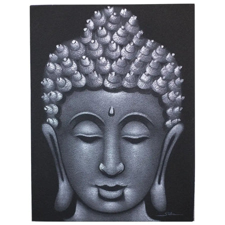Silver-toned buddha head portrait with textured spiky hair and serene expression on dark background with sand finish