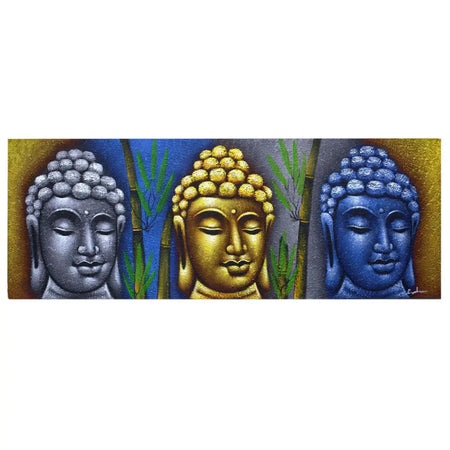Painted canvas wall art showing three buddha heads in silver gold and blue metallic with textured hair and bamboo accents