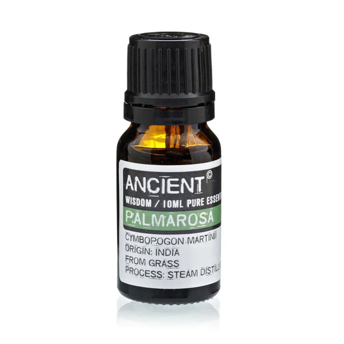 A small amber glass bottle of palmarosa essential oil with a black cap labeled ancient wisdom 10ml by ancient