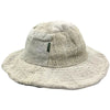 Beige woven cotton boho festival hat with wide brim and subtle texture made of hemp and cotton natural materials