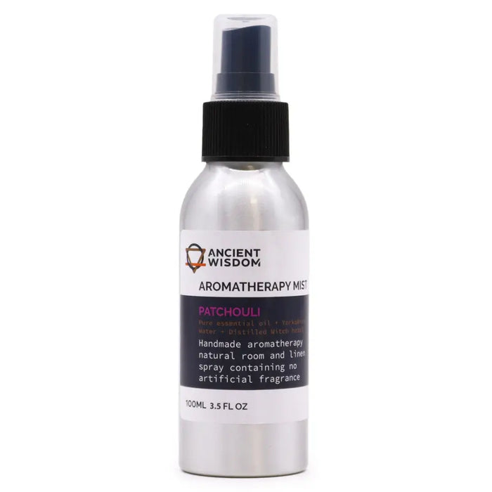 Silver spray bottle with black pump labeled ancient wisdom aromatherapy mist patchouli essential oil 100ml