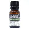 A small amber glass bottle with black cap labeled ancient wisdom patchouli organic essential oil 10ml by ancient