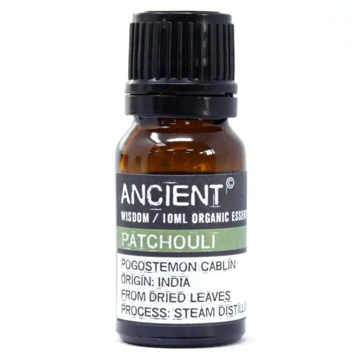 A small amber glass bottle with black cap labeled ancient wisdom patchouli organic essential oil 10ml by ancient
