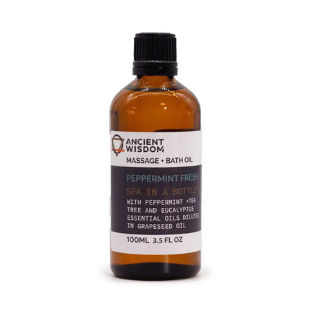 A 100ml amber glass bottle of peppermint fresh massage oil with black cap and essential oils label