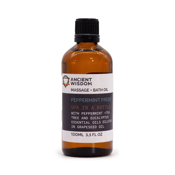 A 100ml amber glass bottle of peppermint fresh massage oil with black cap and essential oils label