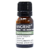 A small amber glass bottle with a black cap of peppermint organic essential oil to alleviate symptoms and allergen declarations