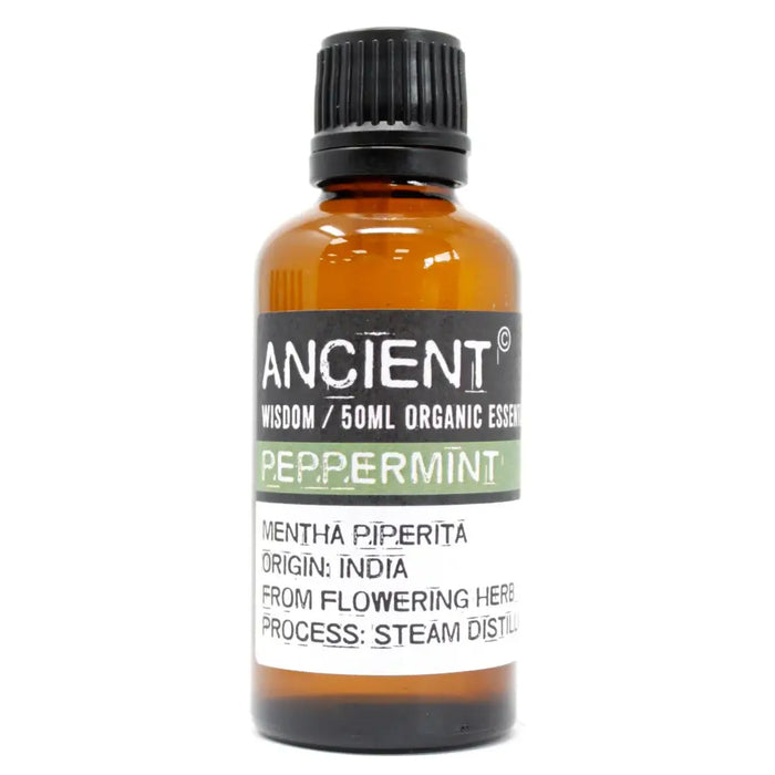 A 50ml amber glass bottle of ancient wisdom organic peppermint essential oil with a black ribbed cap and green label