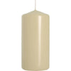 Cream-colored smooth pillar candle made of glossy wax with a thin wick, sized 50x100mm ivory pillar candle