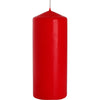 A vibrant red pillar candle with a smooth glossy finish and thin white wick sized 60x150mm