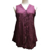 A sleeveless deep purple cotton vest top with v-neck and button front closure in plain design