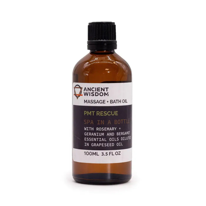 A brown glass bottle with black ribbed cap labeled ancient wisdom pmt rescue massage and bath oil essential oils